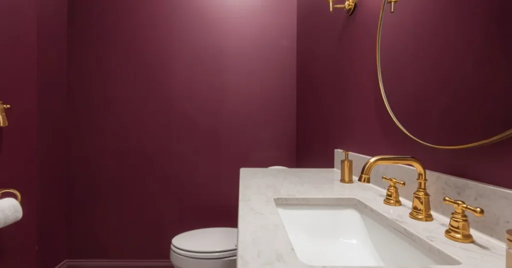 Moody Bathroom with Gold Fixtures and Deep Plum Walls
